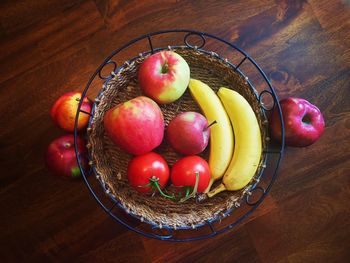 High angle view of apples in basket on table