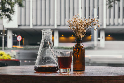 Close-up of glass bottle on table