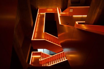 High angle view of illuminated staircase in building