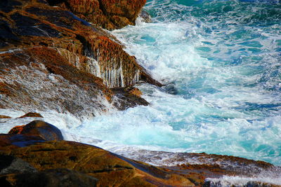 Scenic view of sea against cloudy sky