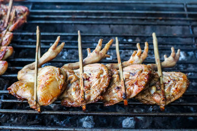 Close-up of meat on barbecue grill