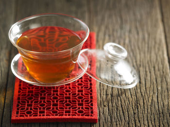 High angle view of tea in glass cup on table