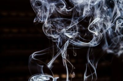 Blurred motion of smoke in darkroom