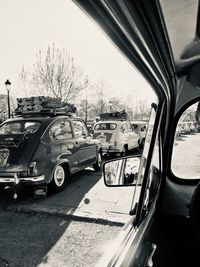 View of city street through car window