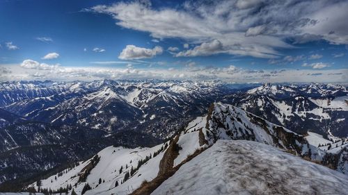 Scenic view of snowcapped mountains against sky