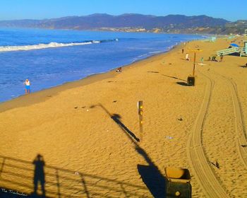 Panoramic view of people on beach