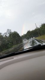 Road seen through car windshield