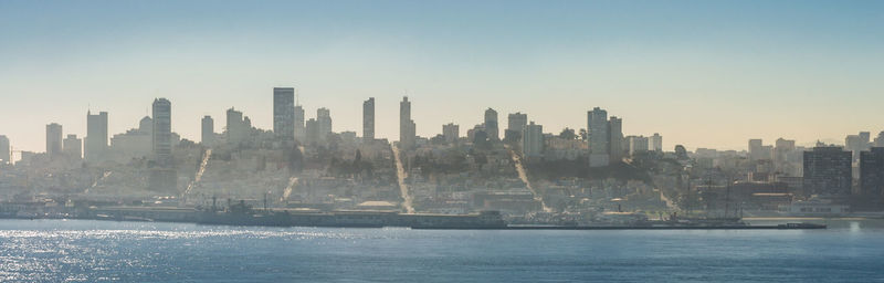 View of buildings in city against sky