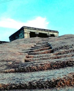 Low angle view of old ruin against sky