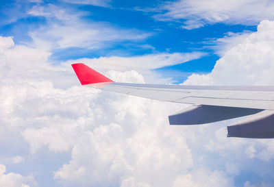 Low angle view of airplane flying in sky