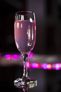 Close-up of wine glass on table