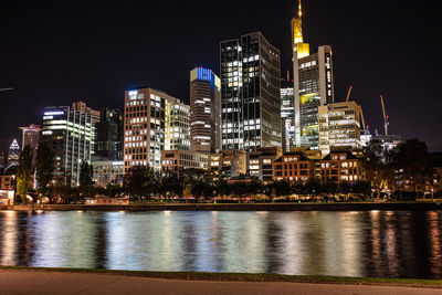 Illuminated buildings in city at night