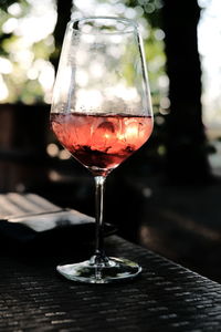 Close-up of wine glass on table in restaurant