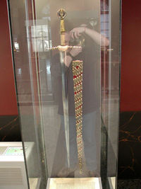 Reflection of man on glass window