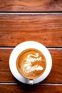 Directly above shot of cappuccino on table