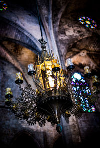 Low angle view of illuminated chandelier