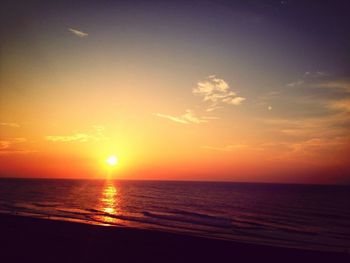 Scenic view of sea at sunset