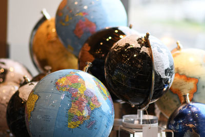 Close-up of crystal ball on glass