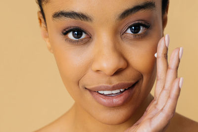 Close-up portrait of young woman