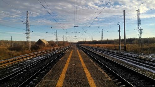 Railroad tracks against sky