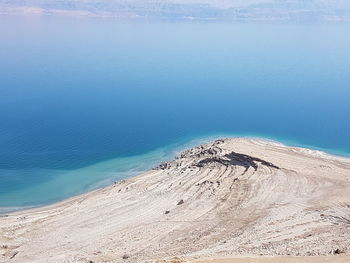 High angle view of sea shore against sky