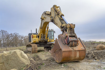 Construction site on field against sky