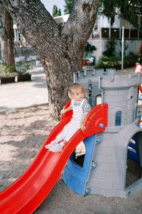 Low section of woman standing in park