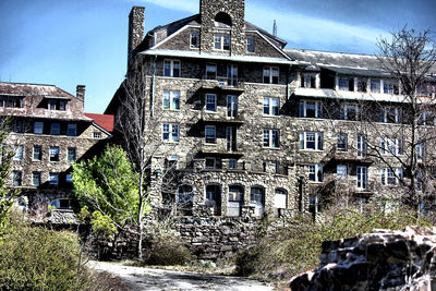 Low angle view of old building against sky