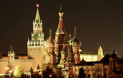 View of illuminated building against sky at night