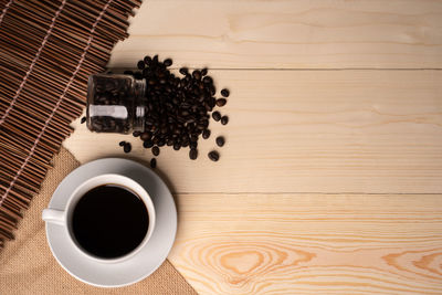 High angle view of coffee cup on table