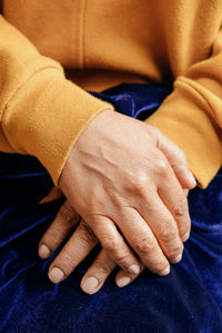 Midsection of woman with hands