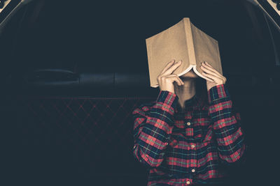 Portrait of a person on a book