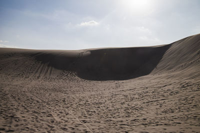 Scenic view of desert against sky