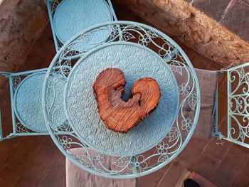 High angle view of wood heart shape on table
