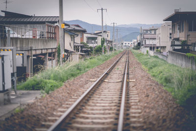 Railroad station platform against sky