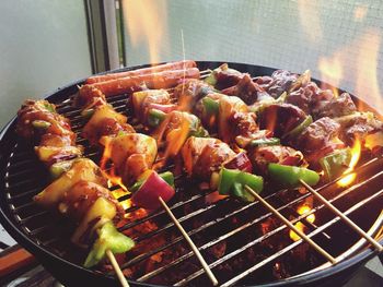 Close-up of meat on barbecue grill