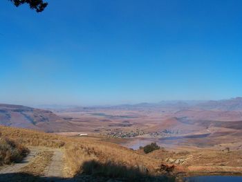 Scenic view of landscape against clear blue sky