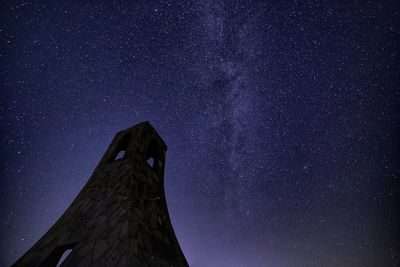 Low angle view of stars against sky at night