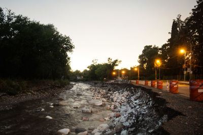 Illuminated street lights at night