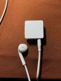 Close-up of telephone booth on table