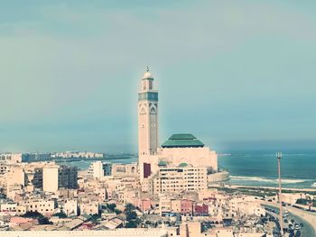 Buildings in city against sky