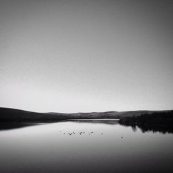 Scenic view of lake against clear sky