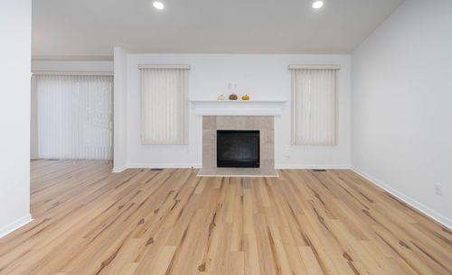 New hard wood flooring has been installed in a renovated home