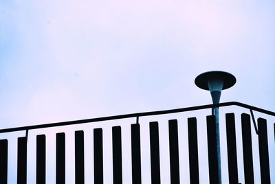 Low angle view of street light against sky