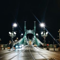 Illuminated street lights at night