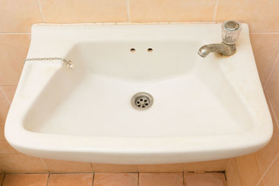 High angle view of faucet in bathroom