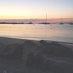 View of beach against sky during sunset