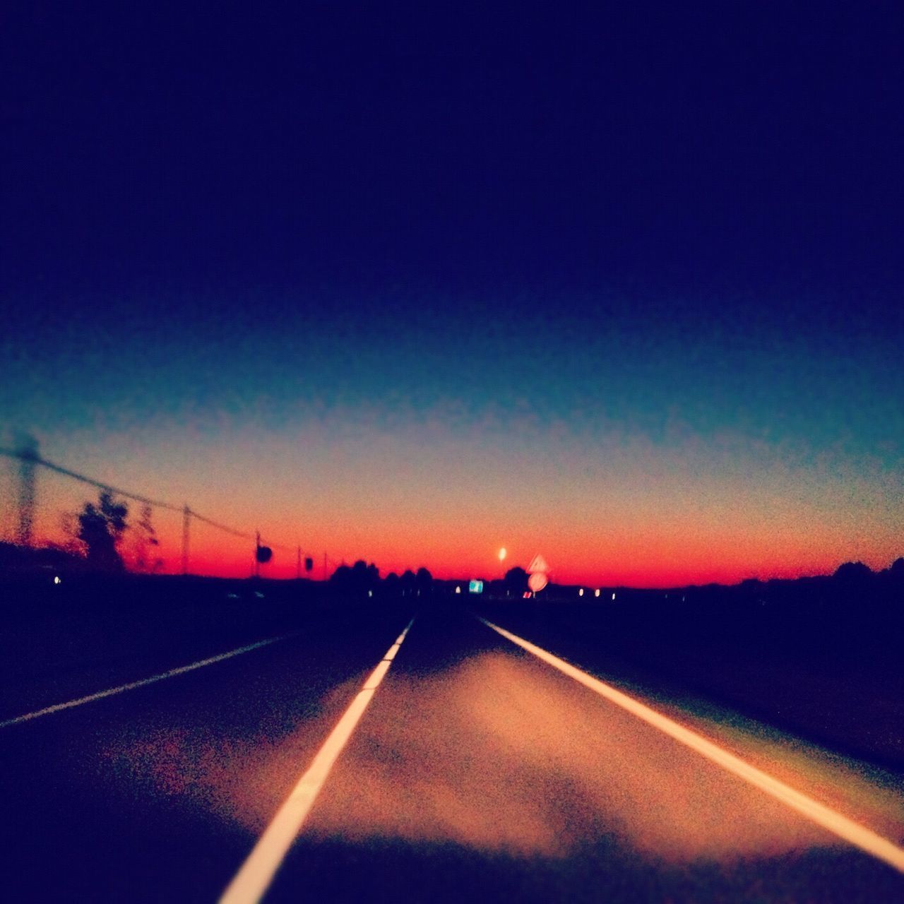 CARS ON ROAD AT NIGHT