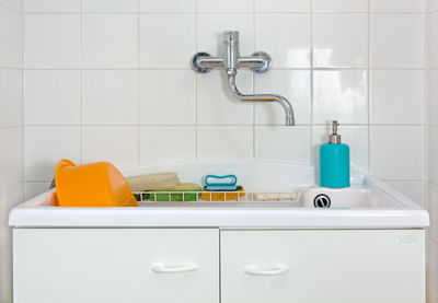 Close-up of faucet in bathroom