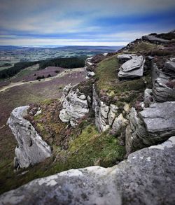 Scenic view of rocks against sky